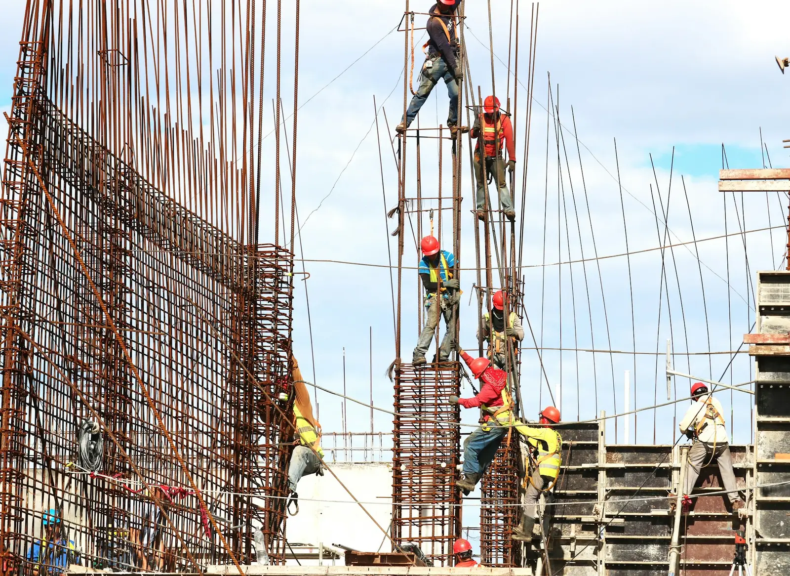 Reinforced concrete structure under construction with steel rebar cages and formwork